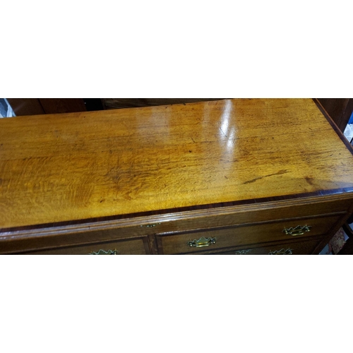 944 - A 19th century Lancashire oak chest with hinged lid, drawers below, various inlay and decorations&nb... 