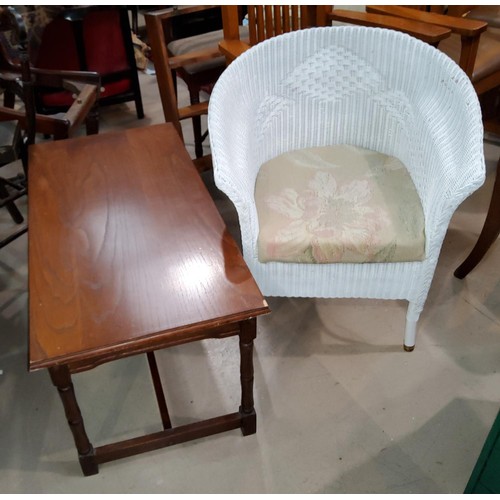 805A - A white Lloyd Loom armchair and an oak coffee table