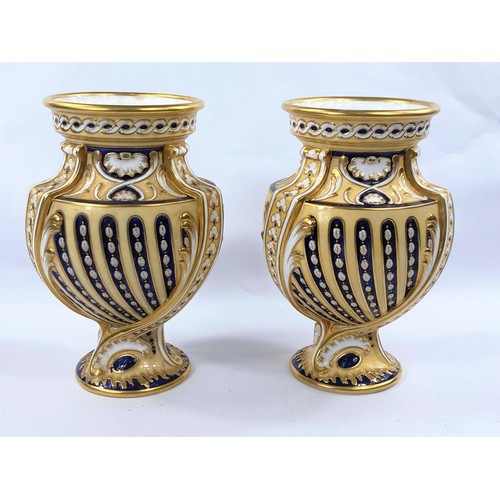 496 - A pair of 19th century English bone china vases, unmarked, 21cm