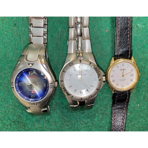 622 - A Swiss Balance Quartz wristwatch, a similar Swiss Balance Farenheight watch and a Seconda watch