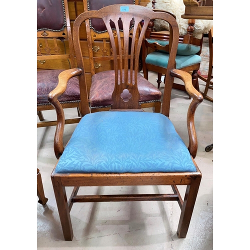 876 - A late 18th/early 19th century 'Country Hepplewhite' armchair on square legs