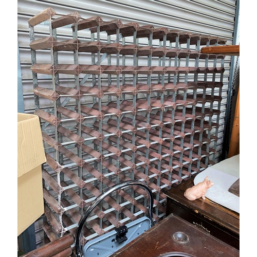 939 - A wood and metal 204 bottle wine rack