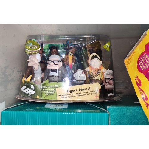 220 - A boxed PIXARS UP, special edition set, a boxed Mulan Dragon, similar cartoon character toys