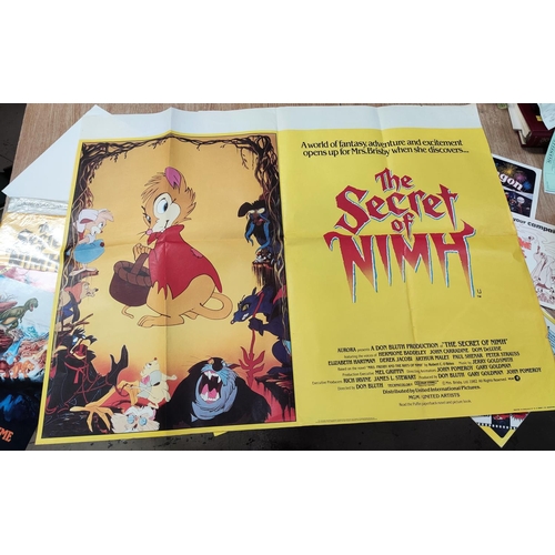 221 - A 'The Secrets of Nimh' original poster, similar press packet with pamphlets for other Disney animat... 