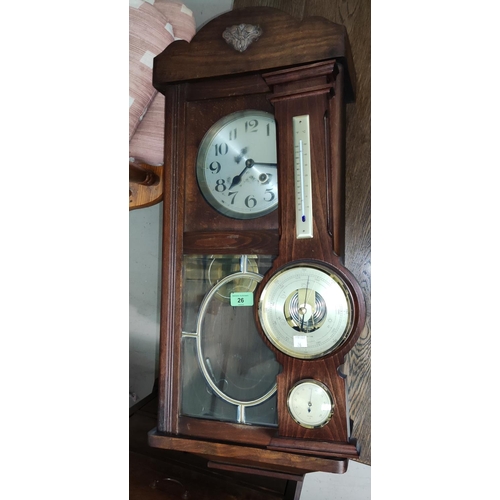 26 - A 1920's wall clock with strike; a reproduction wall clock and barometer
