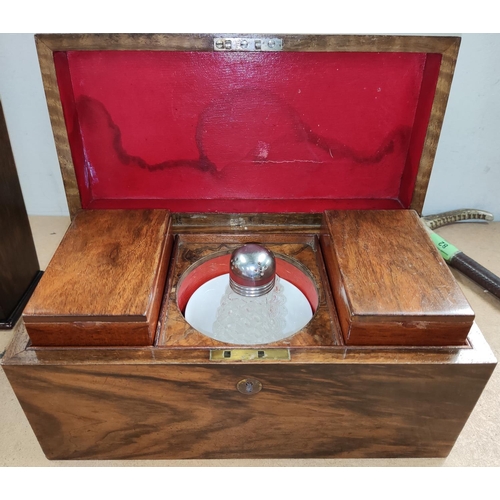 85 - A 19th century figured walnut tea caddy with 2 divisions and central mixing section