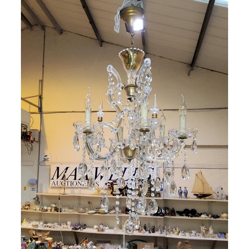 912 - A French 6 branch chandelier with extensive glass drops etc (re-wired), height 82cm (without chain) ... 