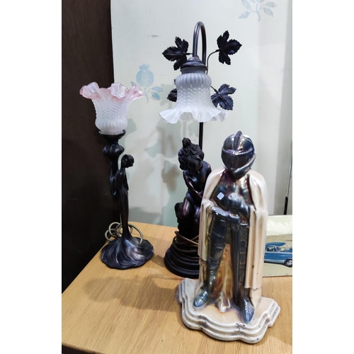 52 - Two Art Nouveau style bronzed table lamps; a knight in armour companion set; etc.