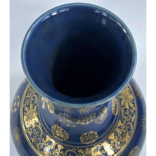 440 - A Chinese blue ground vase with gilt decoration & highlights, with character marks to base, heig... 