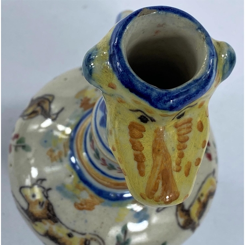 476 - A high fired glazed jug with giraffe head rim