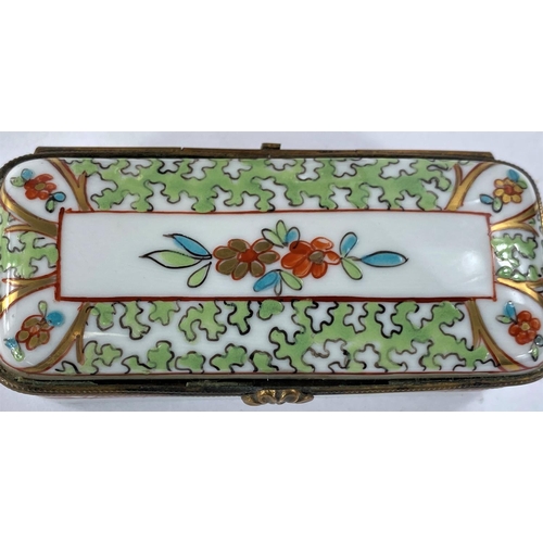 478 - Two pieces of hand painted French porcelain, a patch box and a sewing case, stamped Porcelain Vinemu... 