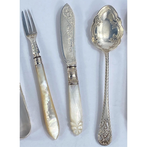 624 - A pair of Georgian hallmarked silver sugar tongs, another pair of hallmarked silver tongs, a silver ... 