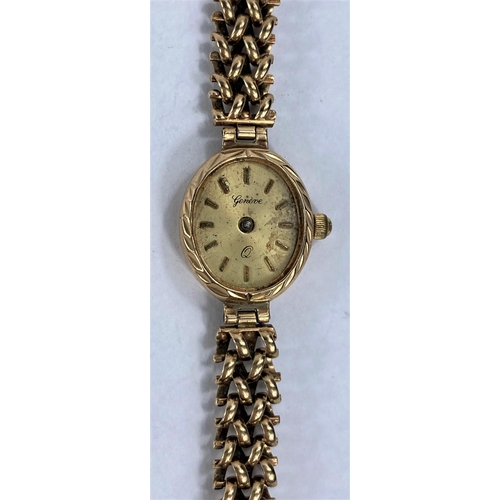 629 - A lady's 9ct hallmarked gold Geneva watch and bracelet strap (face a.f), 13.3gm gross