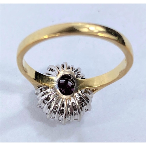 656 - An 18ct hallmarked gold cluster dress ring with central ruby surrounded by 12 diamonds, 5.6gms size ... 