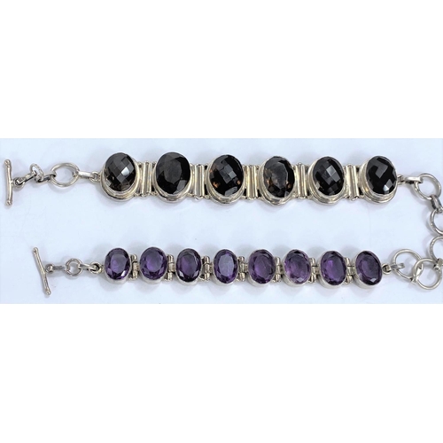 660 - A white metal bracelet set with 6 oval facetted smoky quartz, stamped '925'; a white metal bracelet ... 