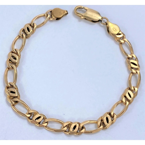 661 - A yellow metal bracelet formed from alternating flattened elongated and triple links, stamped 375, 1... 