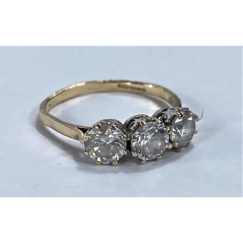 698 - A 14 carat hallmarked gold dress ring set 3 large brilliant cut cubic zirconias, 3 gm size R/S