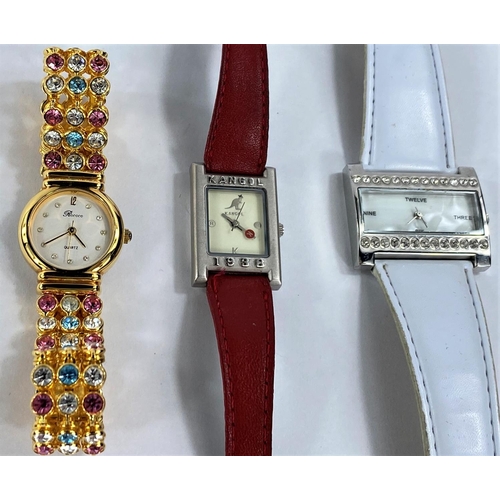 700 - Three modern ladies dress watches; 5 other ladies watches