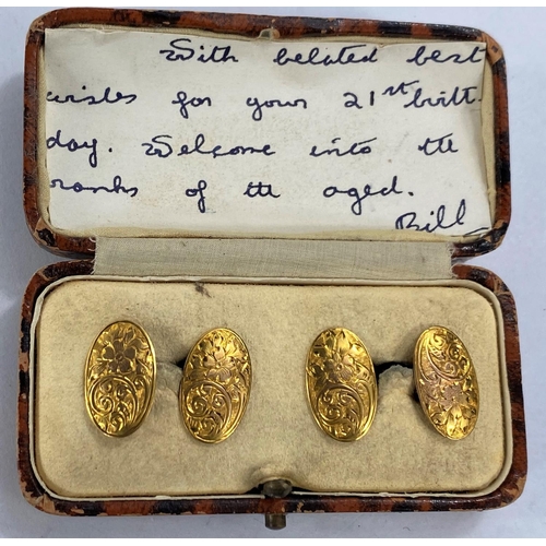 741 - A pair of 9ct gold cased cufflinks with floral decoration, 5gms