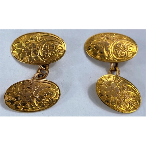 741 - A pair of 9ct gold cased cufflinks with floral decoration, 5gms