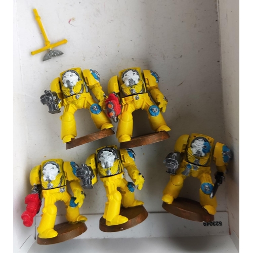 268 - A selection of vintage Games Workshop Warhammer 40,000 Space Marine models, a metal Chaplain, plasti... 