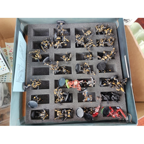 281 - A selection of Games Workshop and other table top terrain, two unfinished Chaos tanks etc