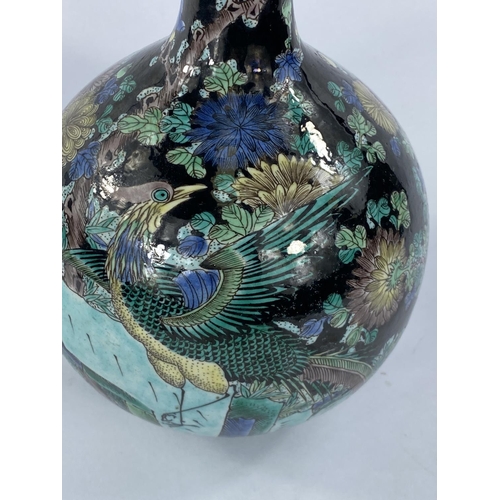 441 - A Chinese bottle vase decorated with green & yellow birds, double circle mark to base, height 28... 