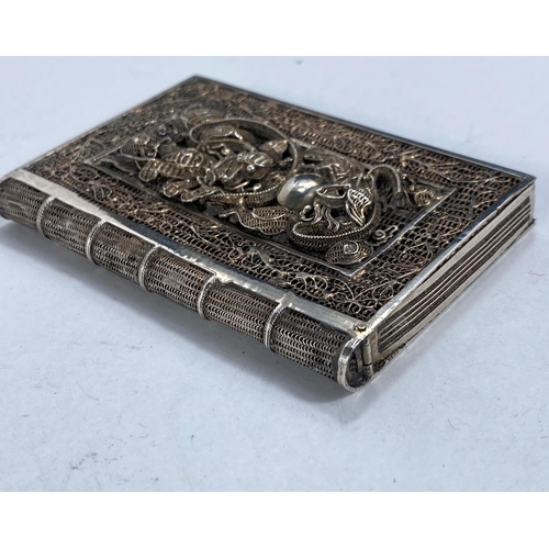 608F - An early 19th century Chinese white metal filigree case in the form of a book with intricate pattern... 