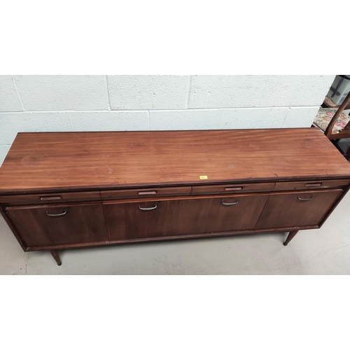 894 - A mid 20th century teak sideboard by White & Newton with four Chamfour barnacled drawers, a fall... 