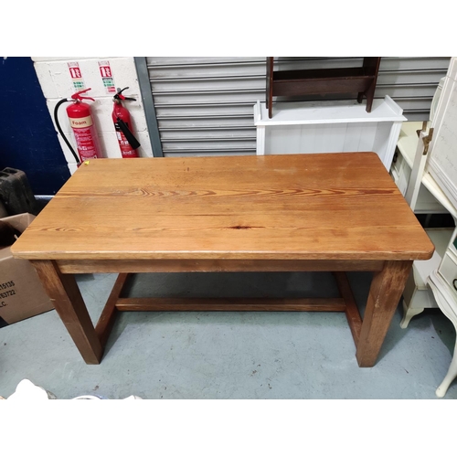 899 - A rectangular pine kitchen table.