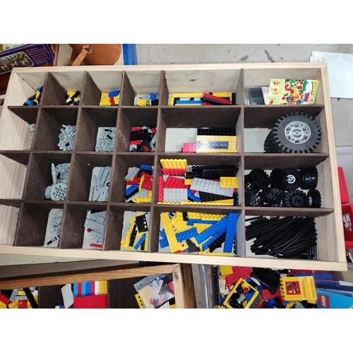 228 - A home-made Lego box with compartments for various Lego pieces and a selection of loose pieces