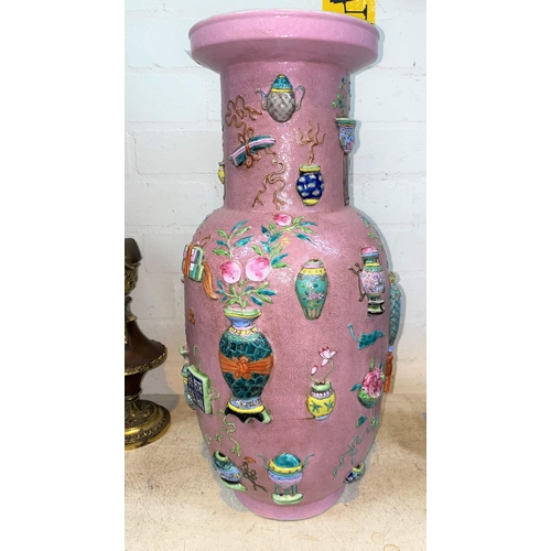 417 - A large Chinese pink ground rouleau vase decorated with antiques in relief, ht 48cm