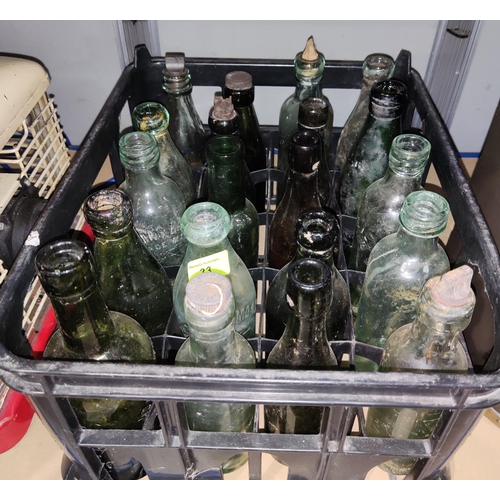 33 - Twenty various vintage green advertising bottlesNO BIDS SOLD WITH NEXT LOT