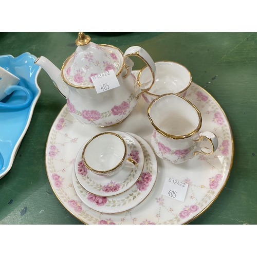 405 - A Royal Winton turquoise & cream polka dot 'Tea for Two' set; a miniature floral 'Tea for One' s... 