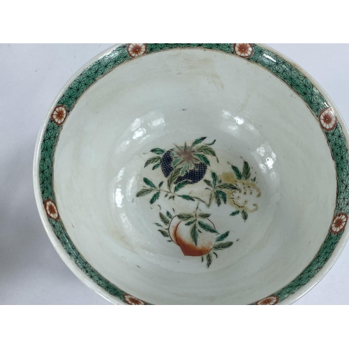 431 - A Chinese bowl decorated with Chinese characters, oxen & farmer, 20cm diameter.