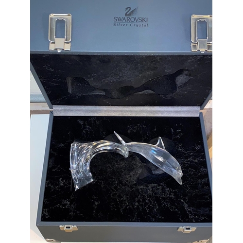 438 - Swarovski Silver Crystal Dolphin Maxi, in original box and case, a dolphin riding the wave design by... 