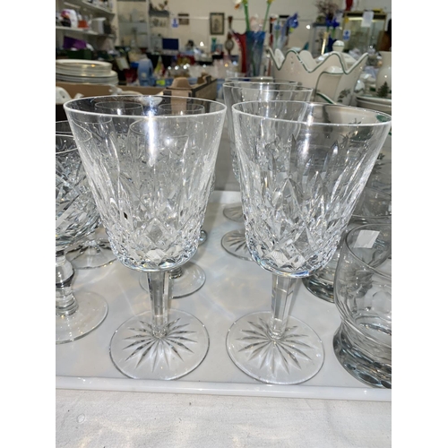 599c - Four Waterford Crystal cut wine glasses, 8 slice cut glass tumblers, other cut wine glasses