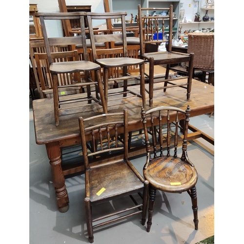 814 - A 19th century pair of country made elm dining chairs with spindle backs; a pair of chapel chairs; 2... 