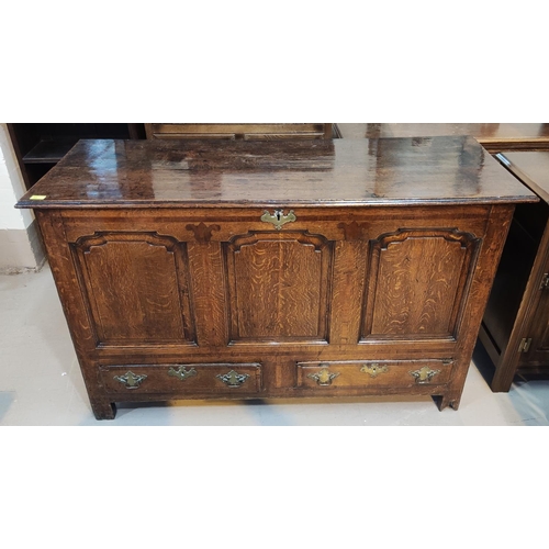 887 - An 18th/19th century oak inlaid mule chest with panel decoration to front and 2 drawers below