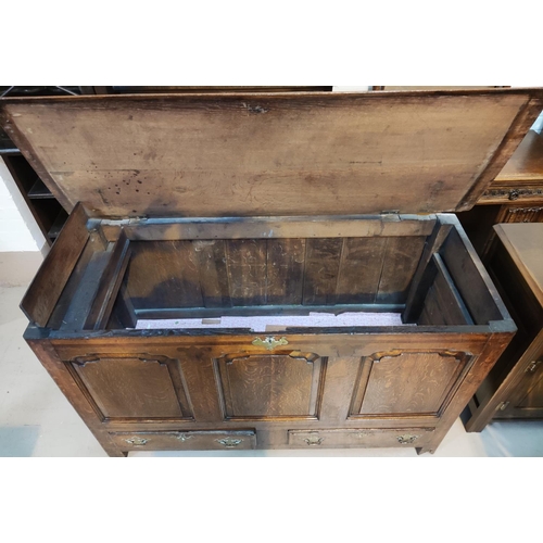 887 - An 18th/19th century oak inlaid mule chest with panel decoration to front and 2 drawers below