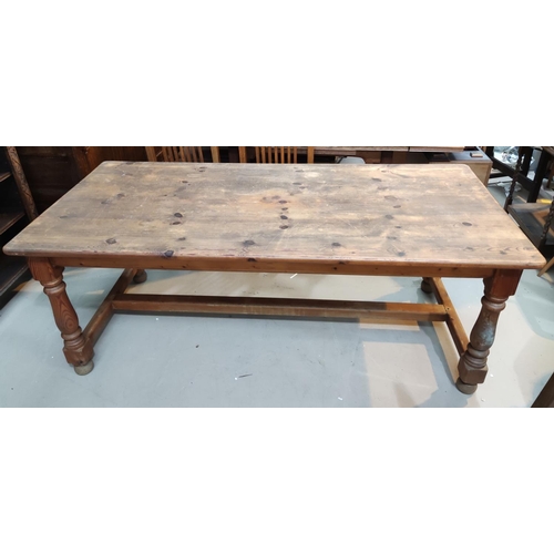 900 - A large rectangular pitch pine farmhouse table, length 198cm.