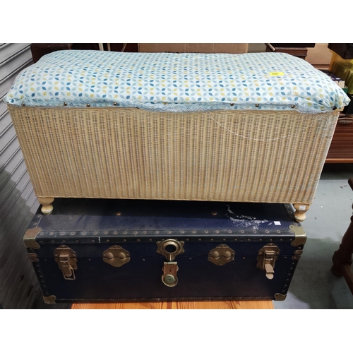 908 - A cream Loyd Loom Ottoman & chair in cream; a cabin trunk.