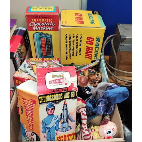 56 - Four 1960's toys in original boxes:  Scott Thunderbird puppet; Chocolate Machine; Gear Robot &a... 