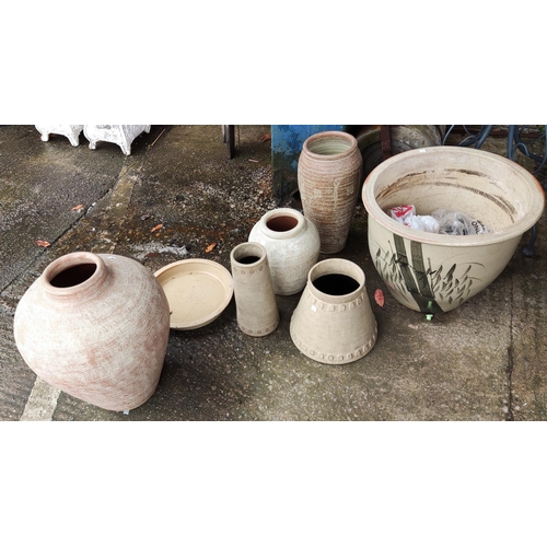 26 - A large stoneware planter; other similar pots