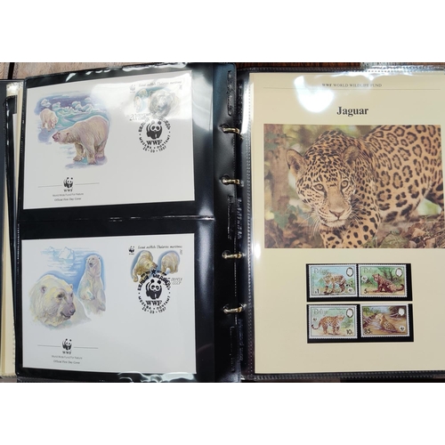 352 - World Wildlife Fund: a collection of World FDCs in album, various GB stamp books and FDCs including ... 