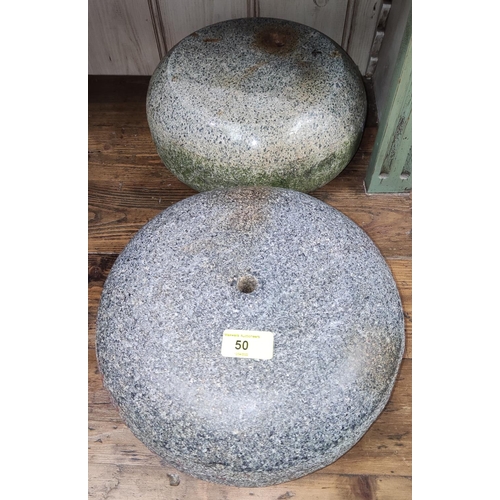 50 - A pair of Scottish curling stones (no handles) granite from Isla Craig, one green, one blue