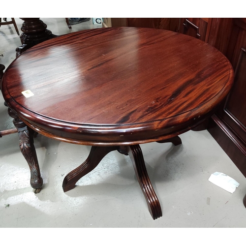 841 - A mahogany coffee table with circular top on pedestal column; 2 occasional tables