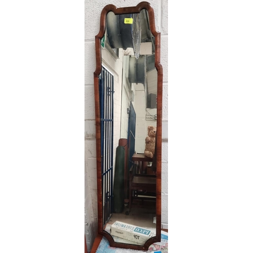 886 - A late 19th century/early 20th century walnut framed full length wall mirror, 125 x 34cm