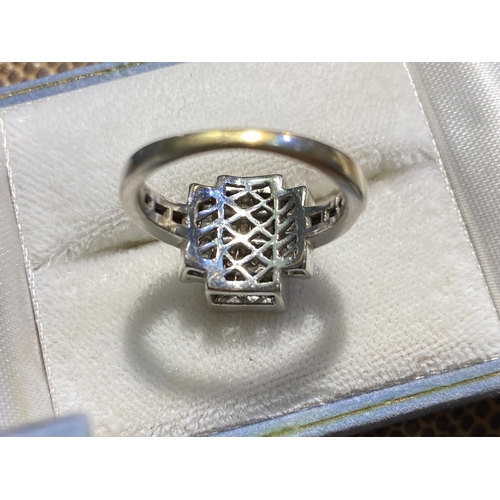 706 - A white metal Art Deco style dress ring with 66 small square cut diamonds in rectangular setting, 2 ... 