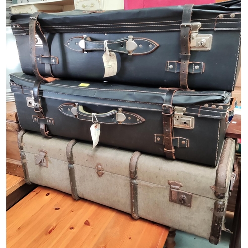 362 - A wood bound cabin trunk; a wardrobe case and vintage luggage